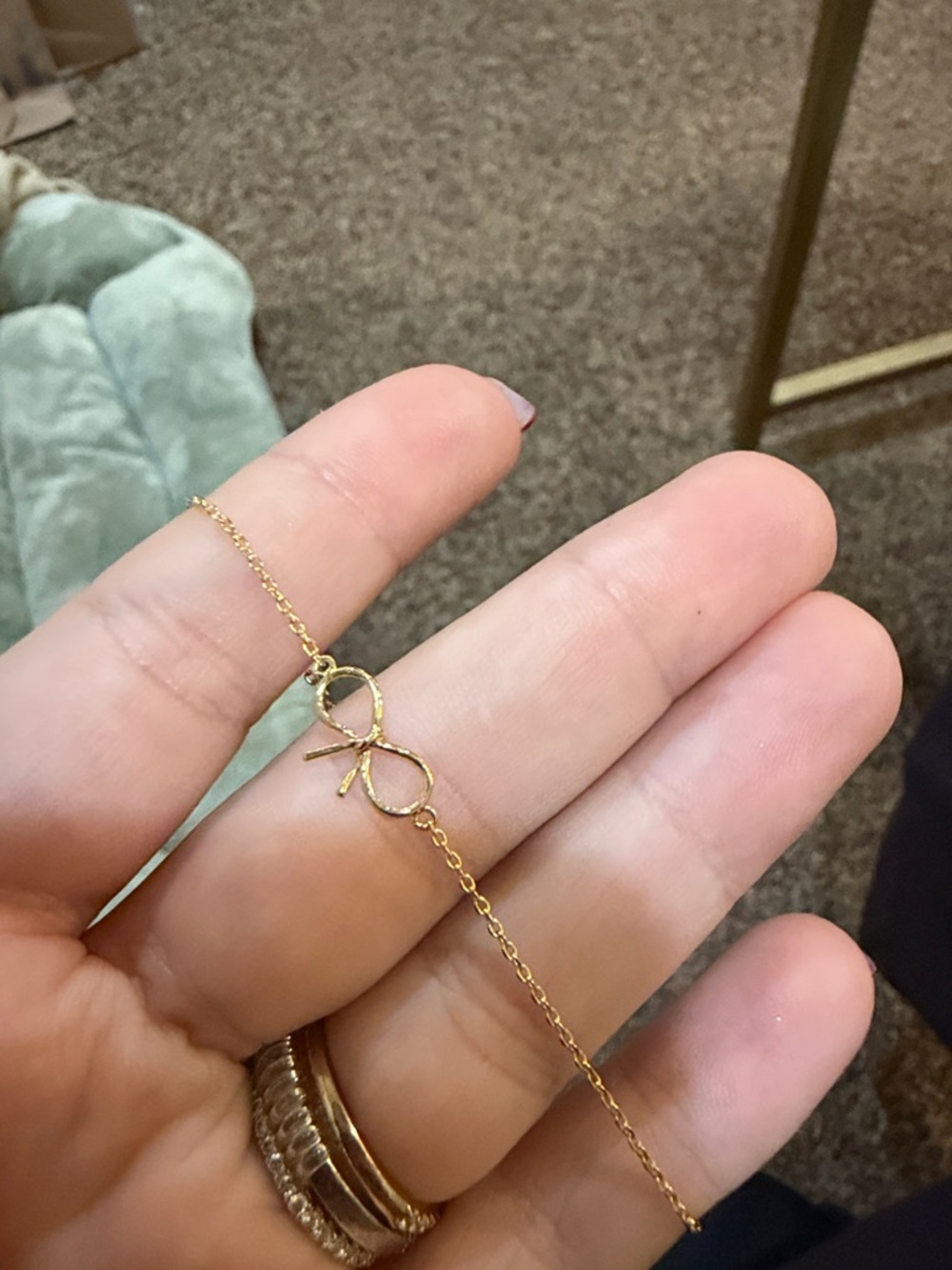 Urban Outfitters Gold Bow Charm Bracelet - Gold Tone